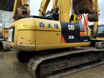 重庆74万元出售卡特彼勒中挖323挖掘机